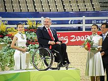 Sir Philip at a medals ceremony at the Beijing 2008 Olympics